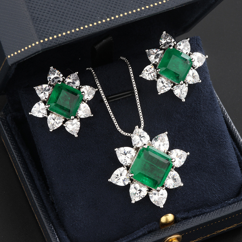 Jewelry pendants, emerald colored gemstone earrings, ring pendants, three pieces
